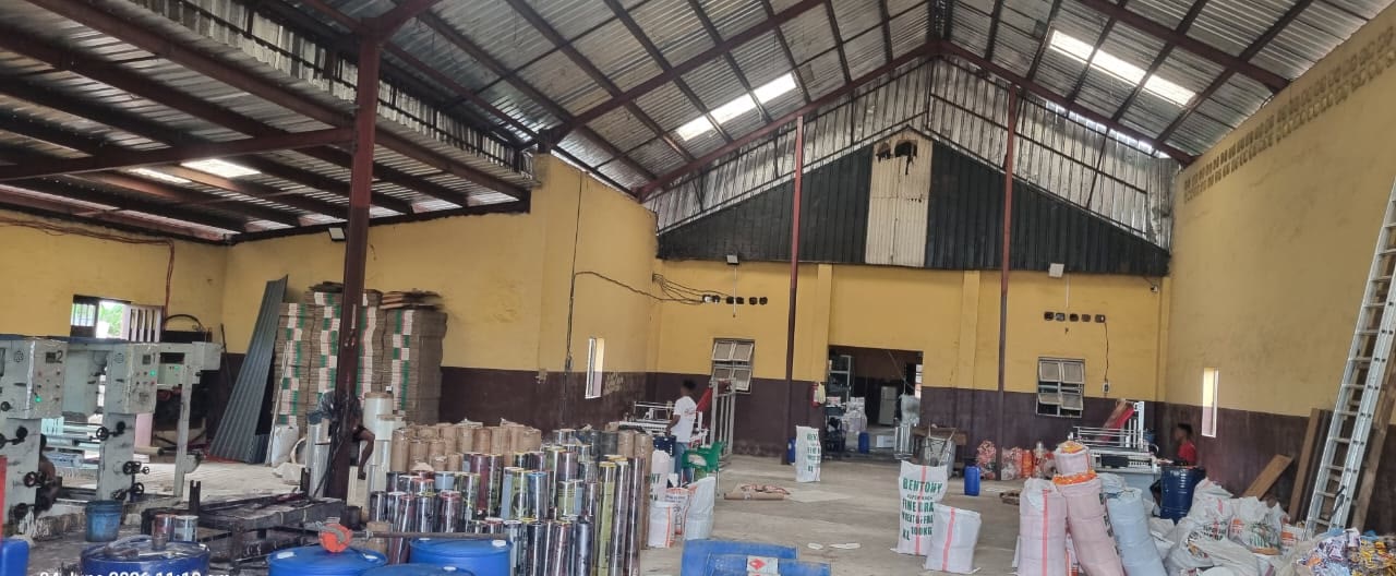 Carton stock and printing rolls inside the Mimshak Pak packaging factory in Asaba, Delta State
